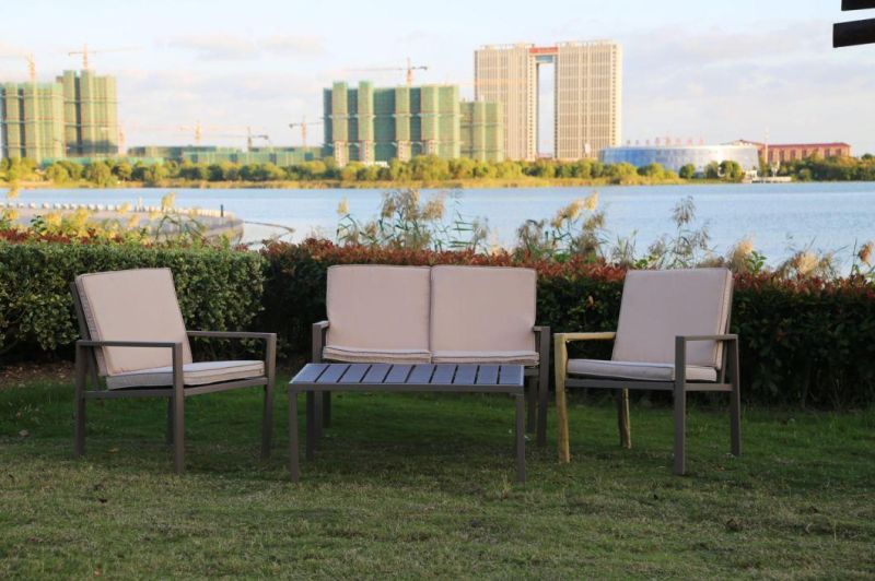 Outdoor Hot Sale Wholesales Modern Style Steel Frame Furniture PE Plastic Wooden Grain Coffee Color Patio Sofa Set in Garden Coffee Table and Chair in Talk