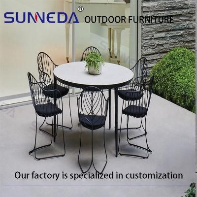 Iron Frame Dining Table and Waterproof Cushioned Chairs