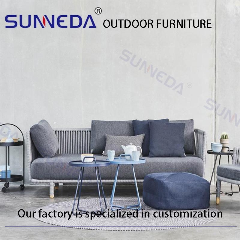 a Three-Person Sofa with Tarpaulin Cushions and End Tables