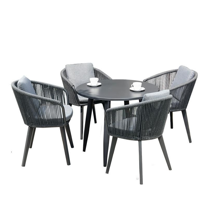 Plastic Wood Table and Rope Chair Outdoor Furniture