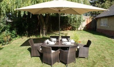 Rattan Chair and Table With Umbrella